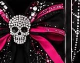 Detail of the rhinestone skull bow charm